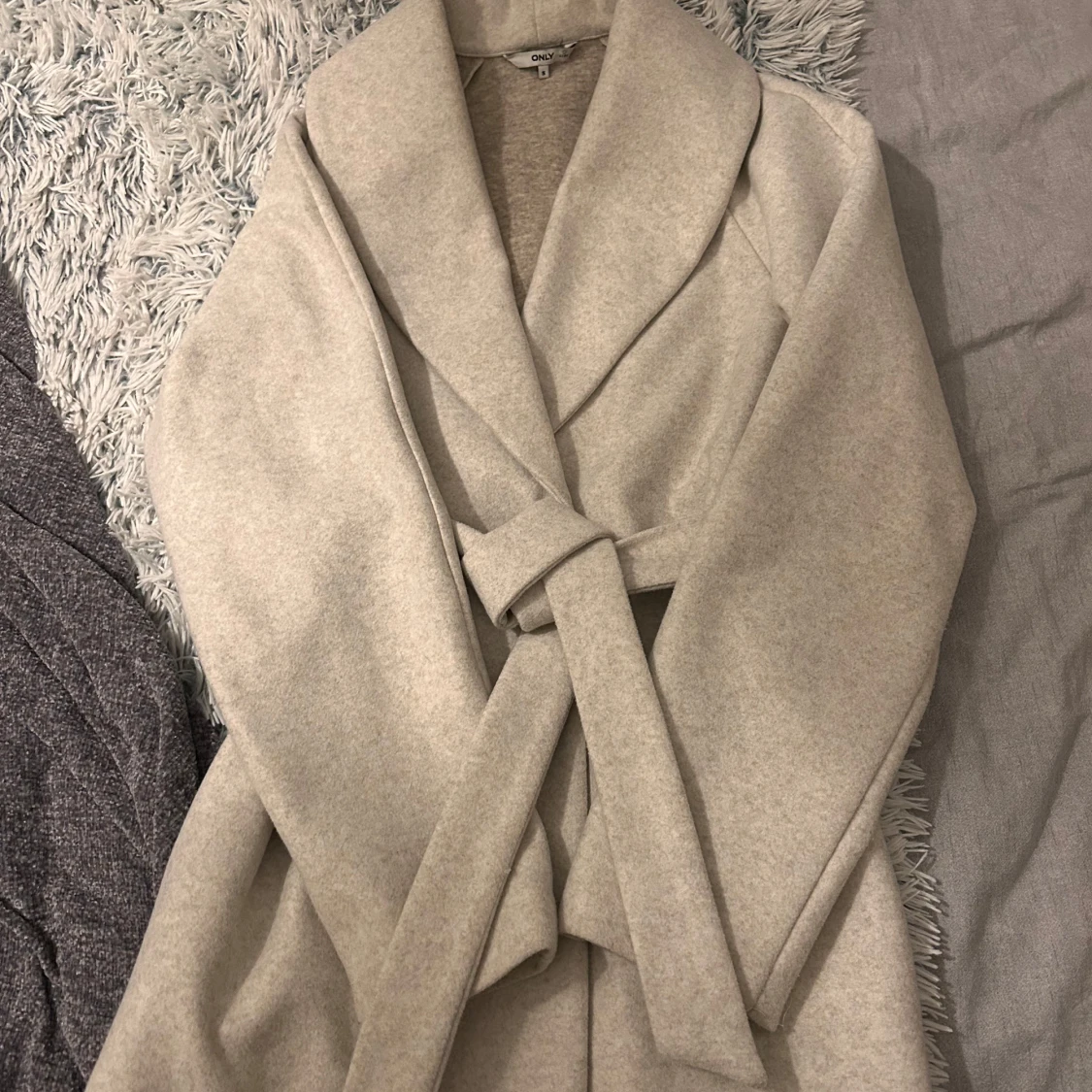 Beige kappa med knytning  - 1