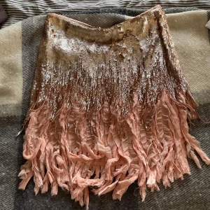 Glittrig zara kjol  - Glittrig rosa, champagne kjol. 