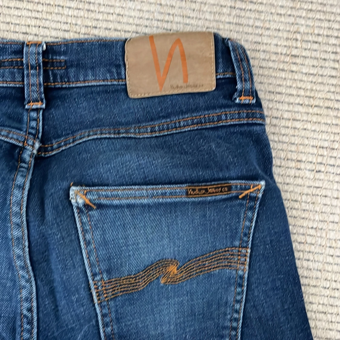 Blå jeans från Nudie Jeans Grim Tim 28W 32L - 4