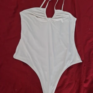 Body suit - En jätte fin body suit som har inte kommit till användning 💕