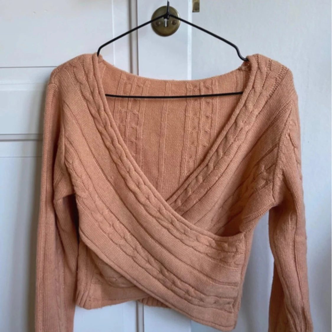 Stickad omlottopp i aprikos - 1