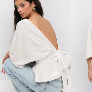 Tie back top - Intressekoll på denna super fina topp. Stl M med prislapp kvar. Kom privat för fler bilder 