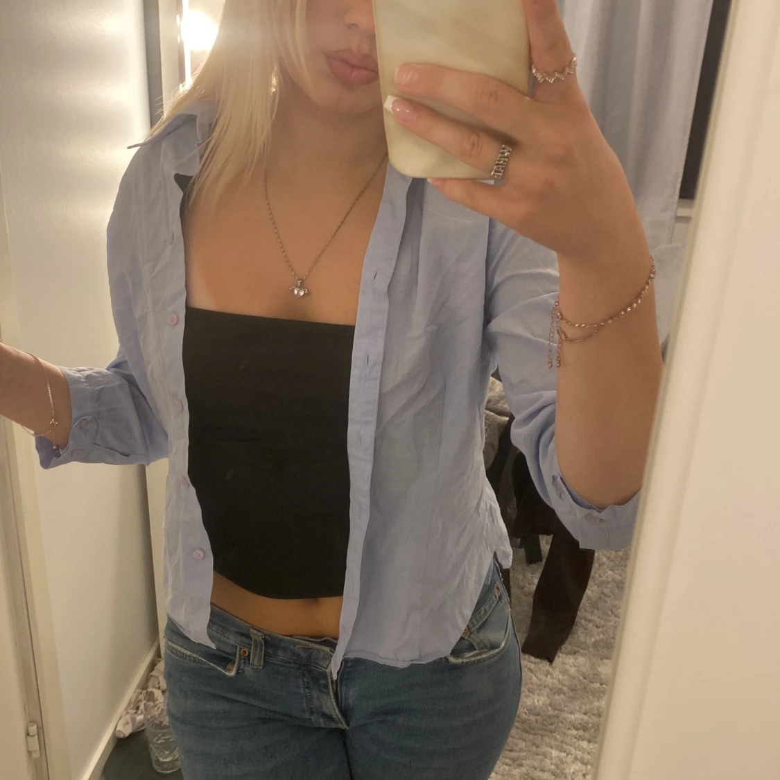 Ljusblå skjorta med trekvartsärm