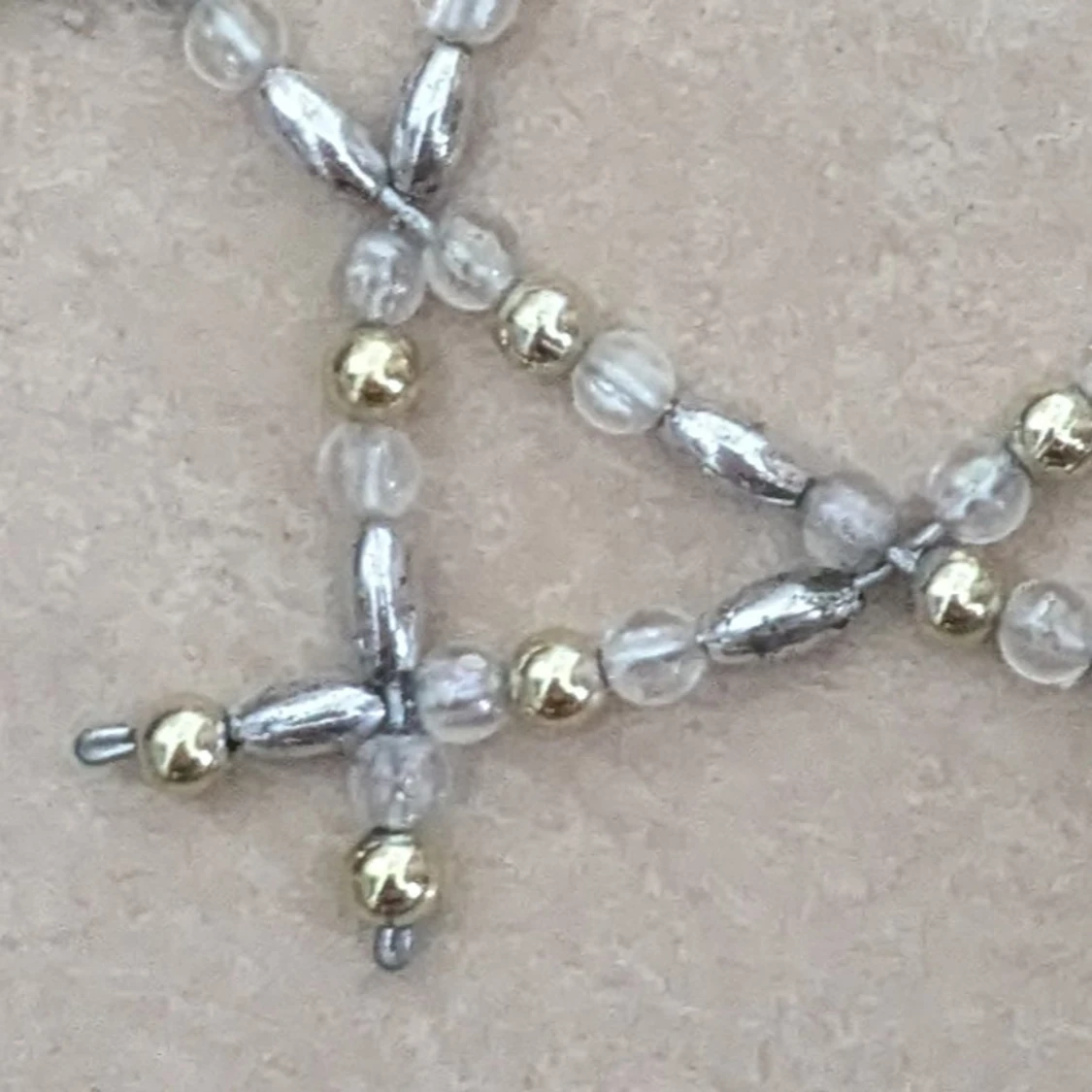 Pärlad stjärna i silver och guld - 2