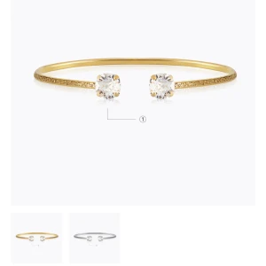 Guld armband - Säljer ett jättefint diamantarmband med guldplätering från Caroline svedbom. I jättefint skick!  Nypris 595