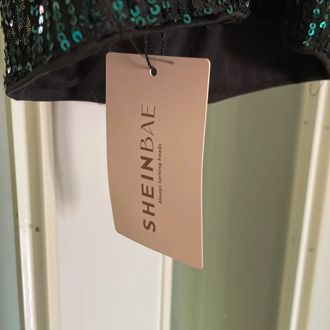 Paljettklänning - 2