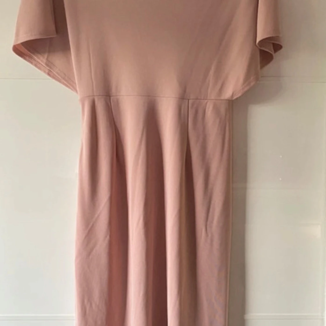 Ljusrosa omlottklänning i polyester - 1