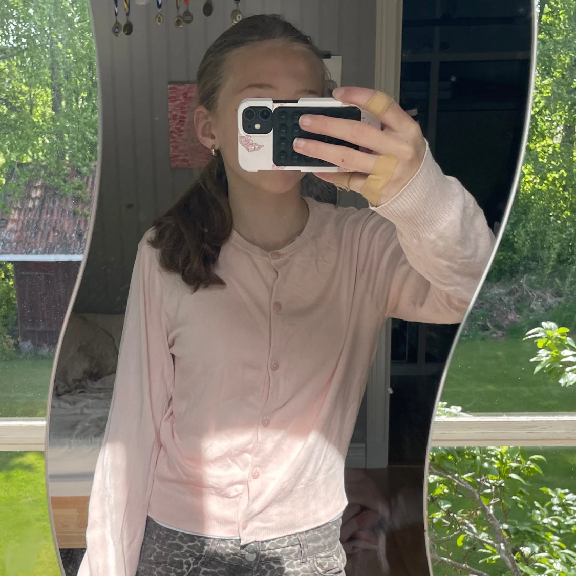 Ljusrosa kofta från Divided