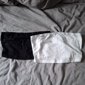 Svart och vit tubtopp - Två enkla tubtoppar i svart och vitt.