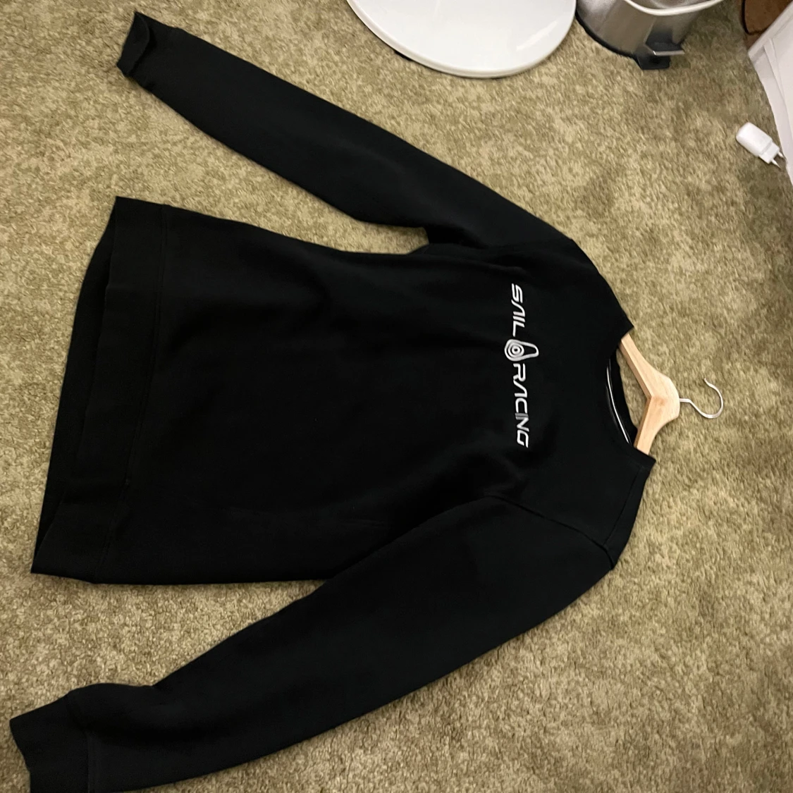 Svart sweatshirt från Sail Racing