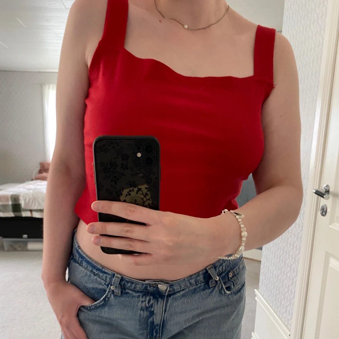 Röd ribbad linnetopp