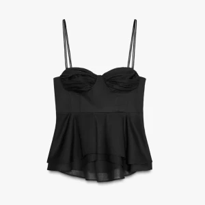 Svar korsettopp från Zara - Supersnygg svart korsettopp från Zara med peplumvolang och dubbla tunna axelband. Toppen har draperad byst och markerad midja, samt dragkedja i sidan för enkel påklädning. 