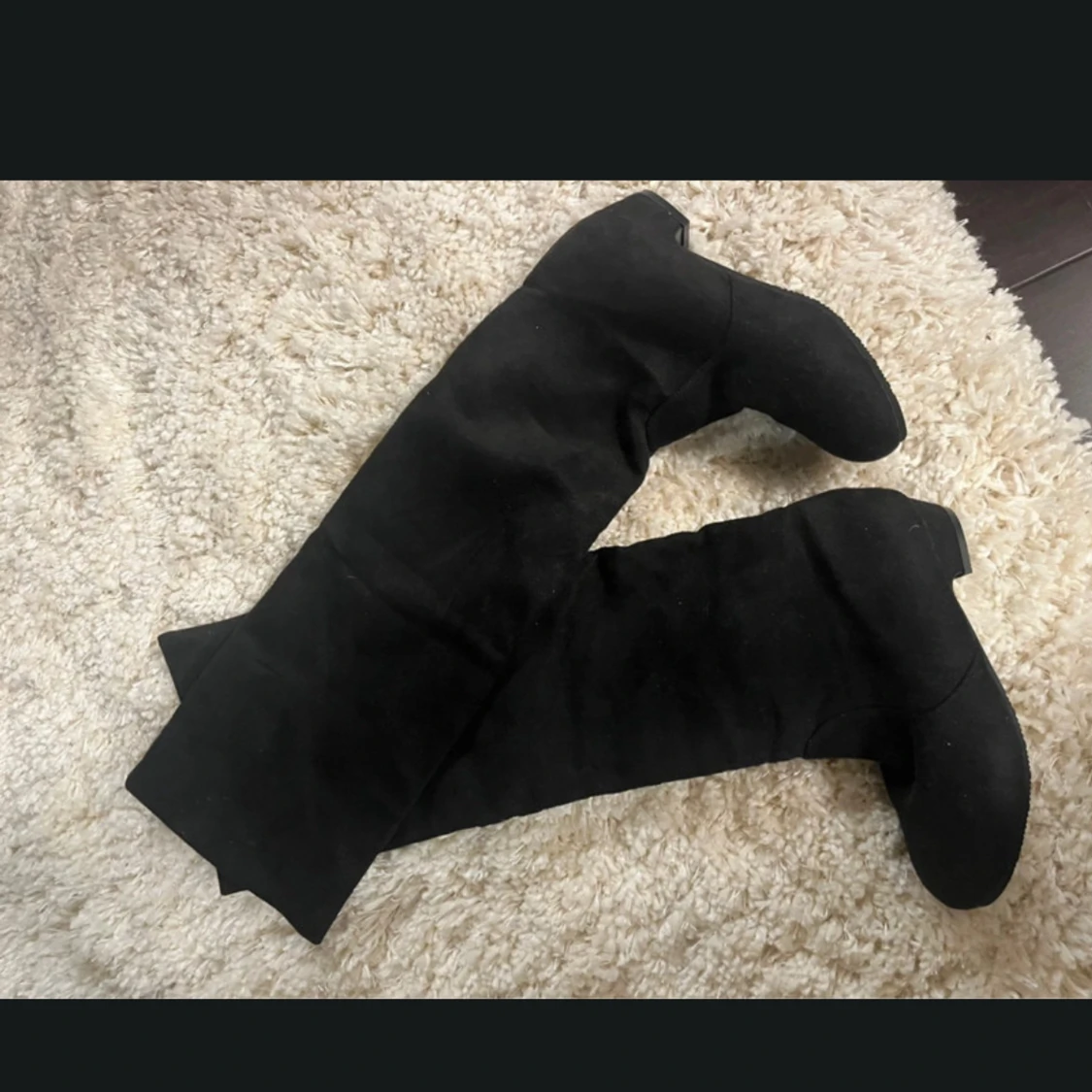 Svarta höga boots i mocka