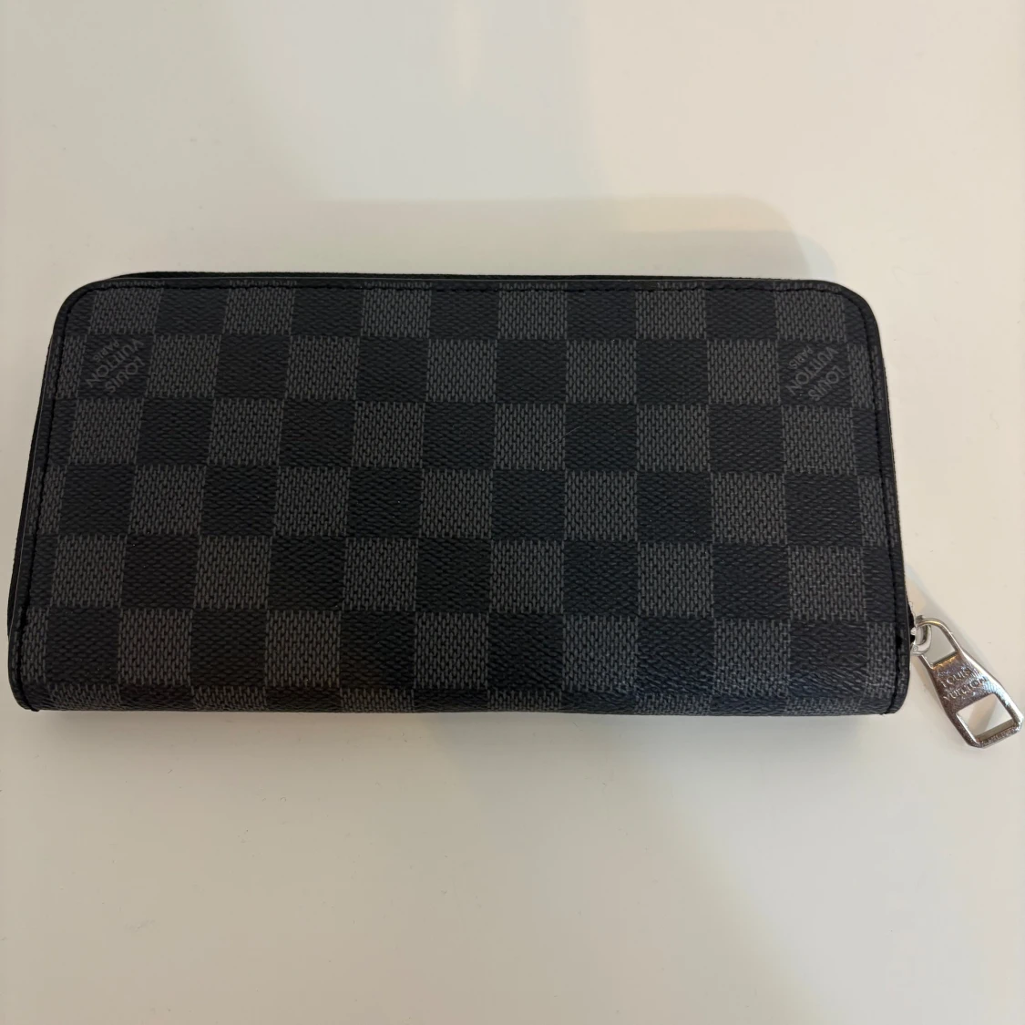 Rutig plånbok i skinn