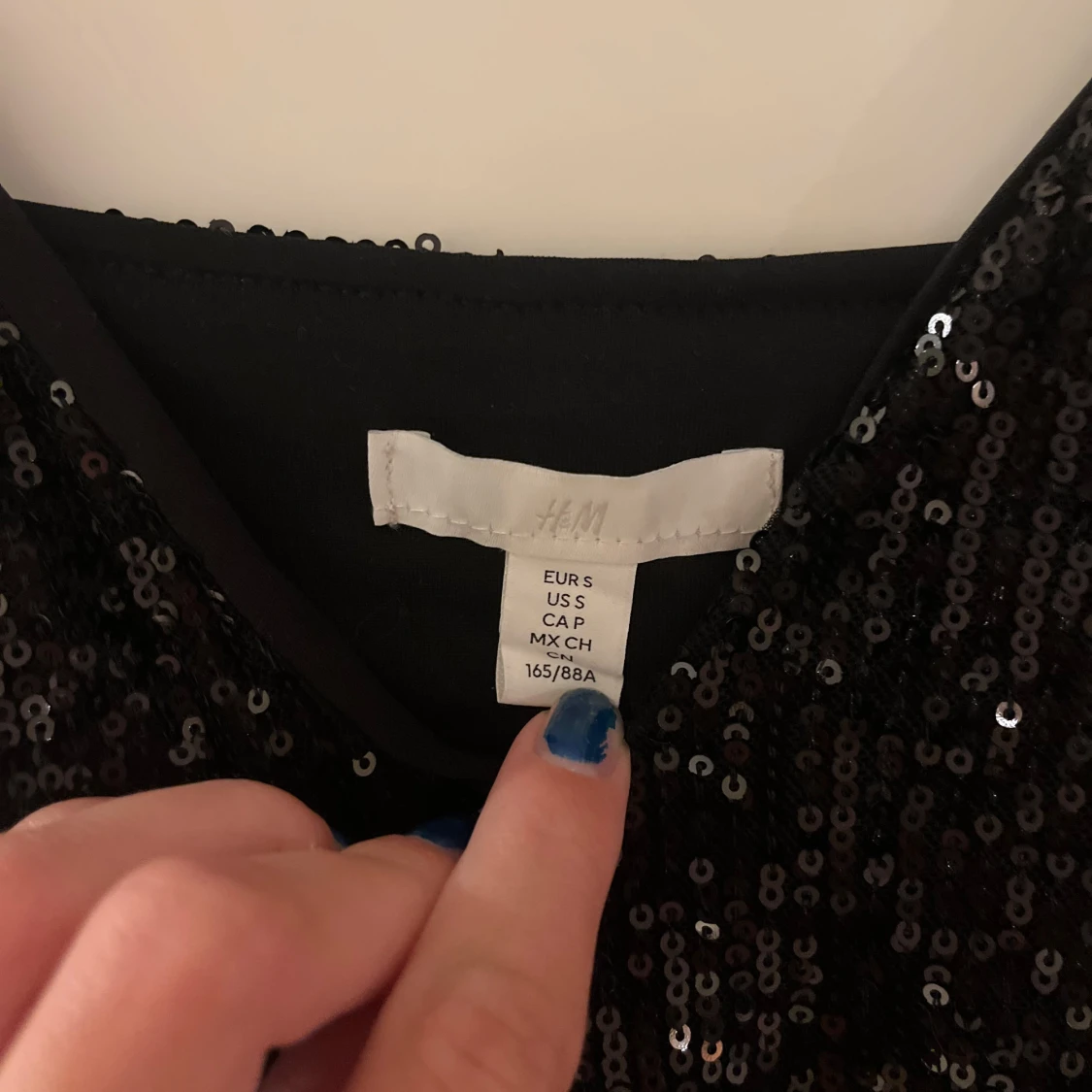 Svart paljettlinne från H&M - 2