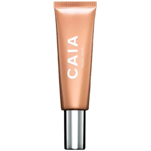 CAIA Pearl Swirl highlighter - Säljer en CAIA Pearl Swirl highlighter i tub med pump och silvrig kork. Ger en snygg glow med pärlskimrande finish. Tuben är i en lyxig guldig-bronsig färg och passar perfekt för att framhäva ansiktets höga punkter.