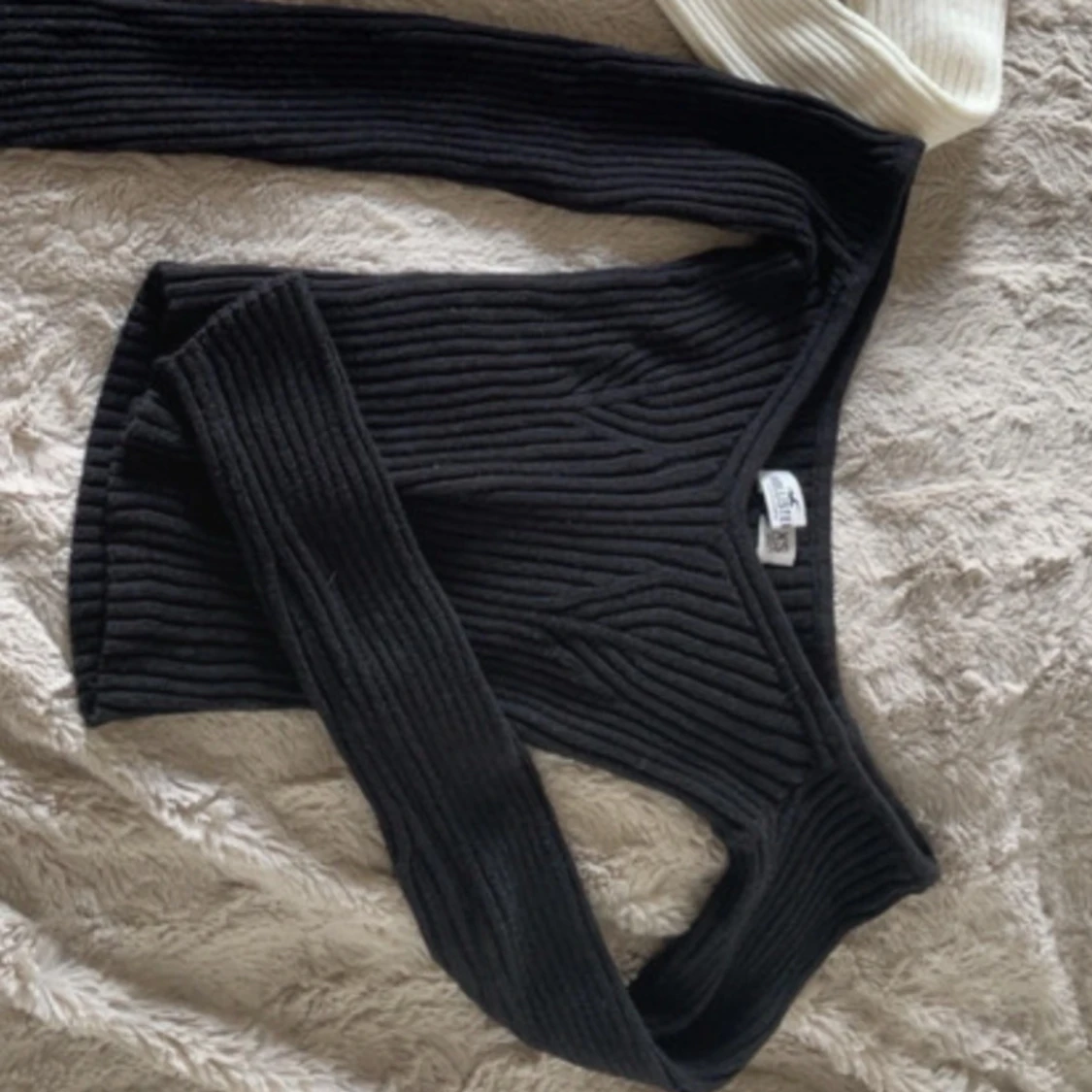 Svart ribbad stickad tröja Hollister