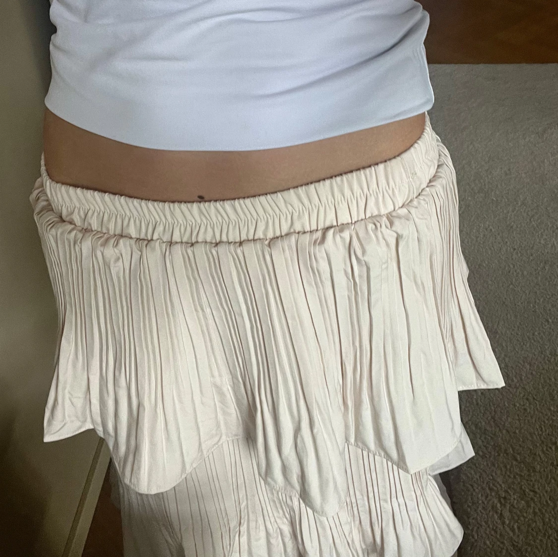 Plisserad långkjol med volanger - 1