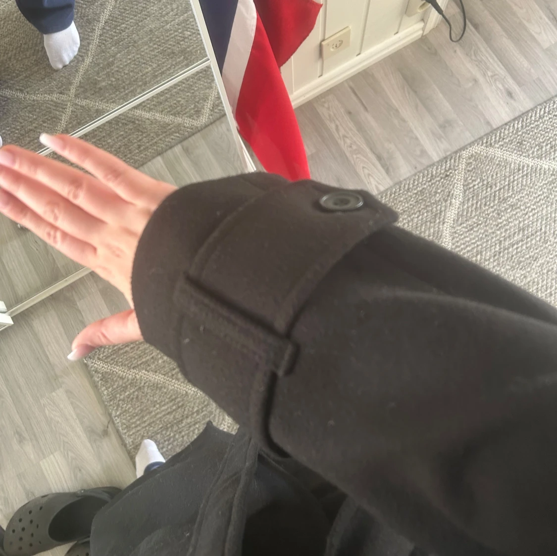 Lång svart kappa från Nelly - 2