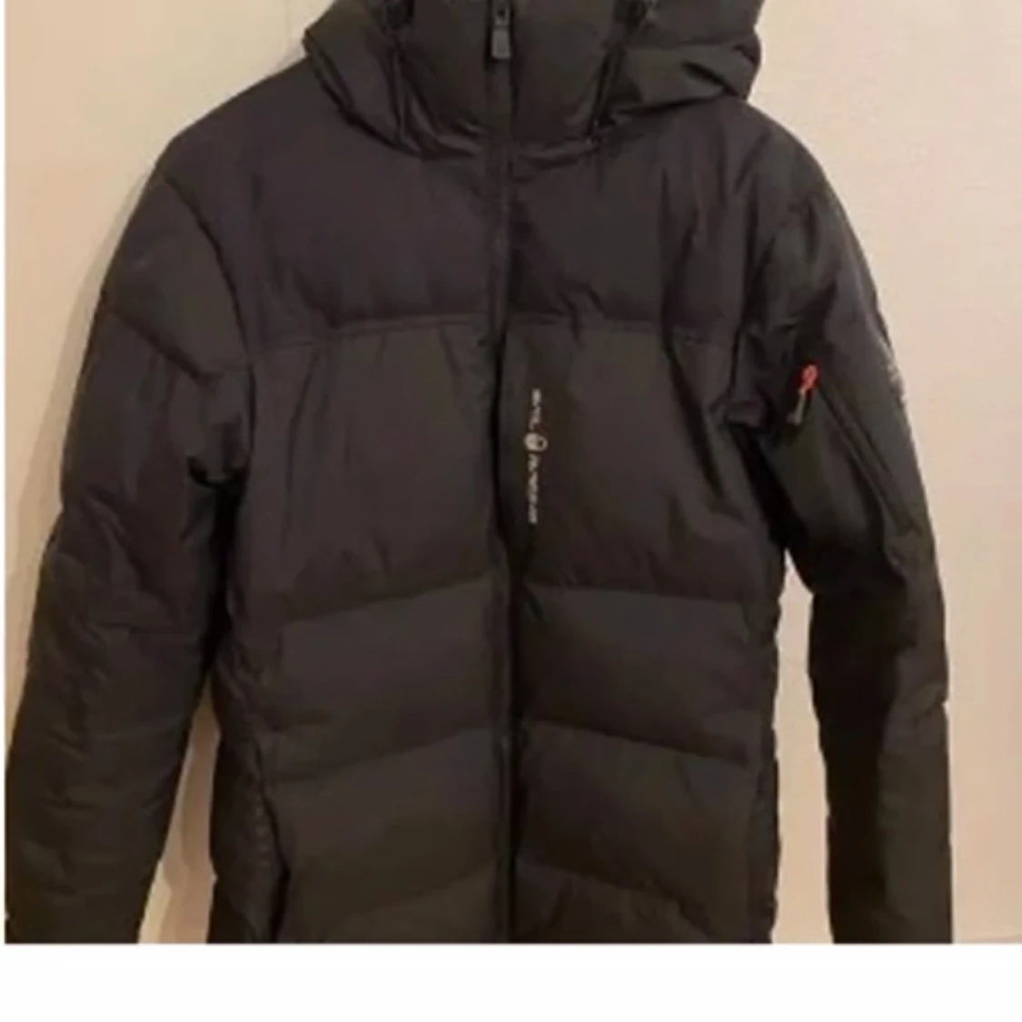 Svart dunjacka från sail racing  - 2