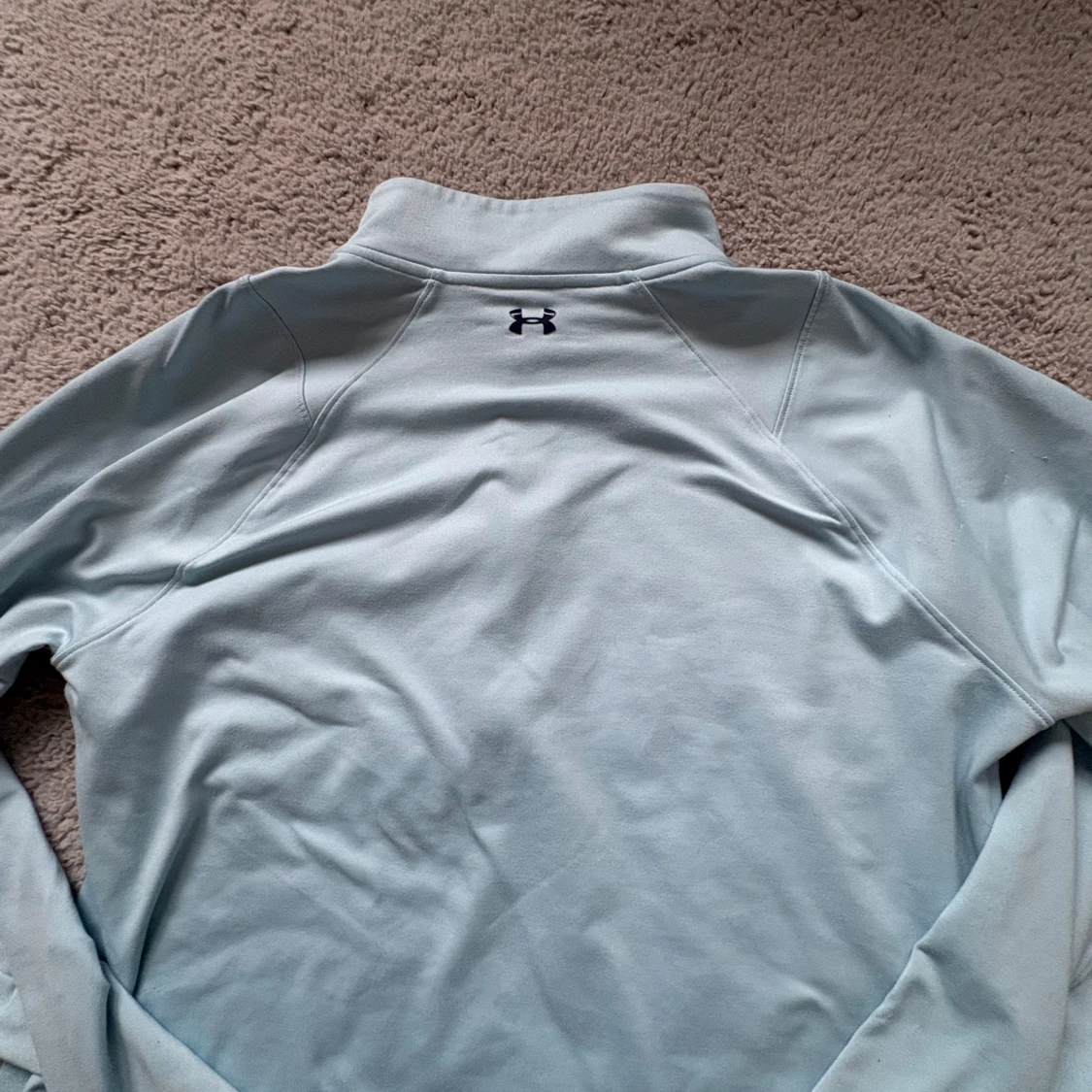 Ljusblå långärmad träningströja från Under Armour - 1