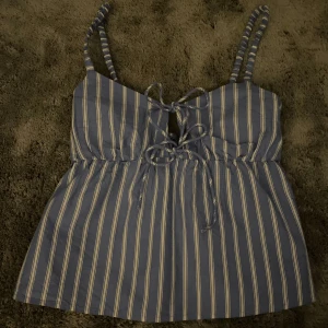 Linne - Gulligt rosett linne från H&M divided