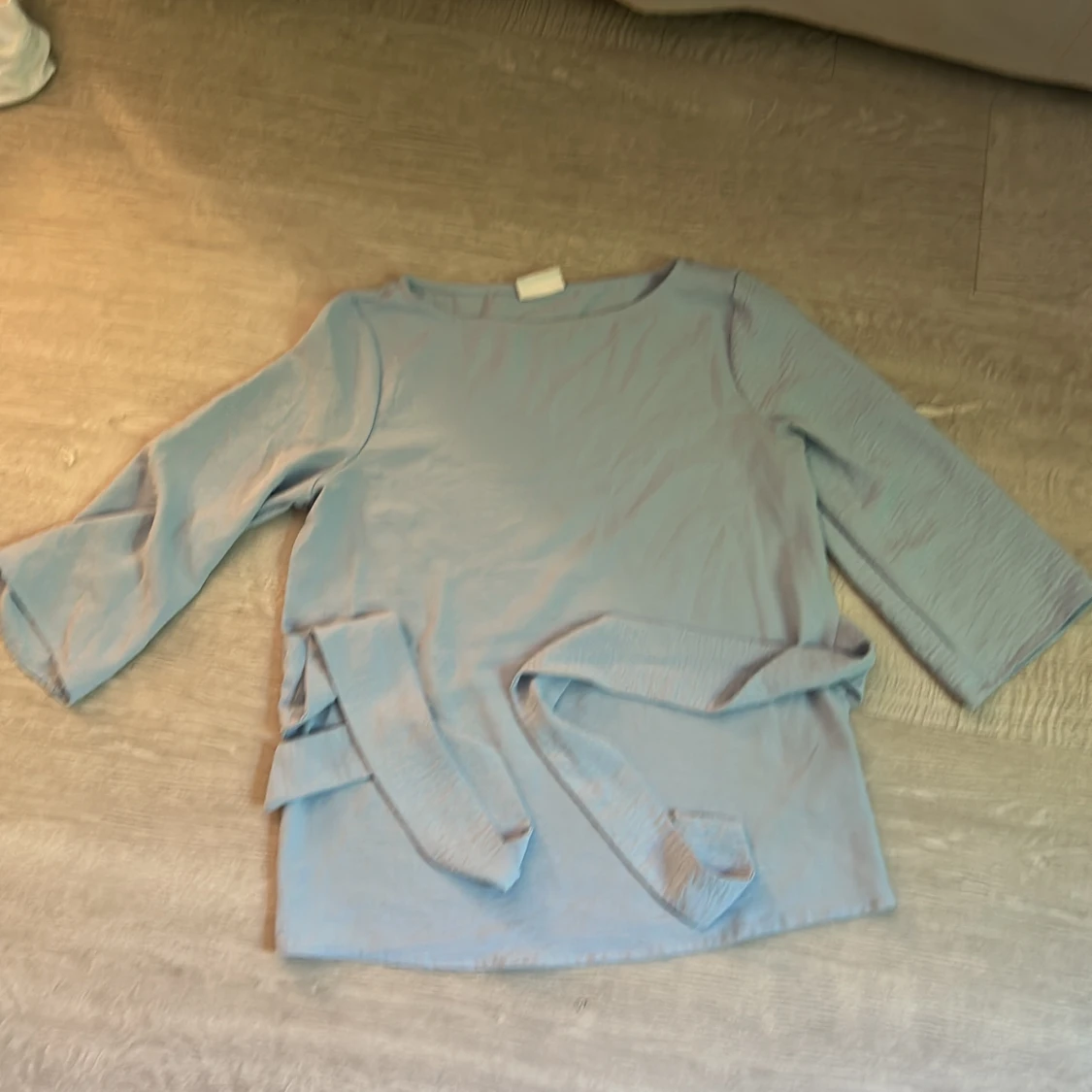 Ljusblå omlottblus från Vila - 2