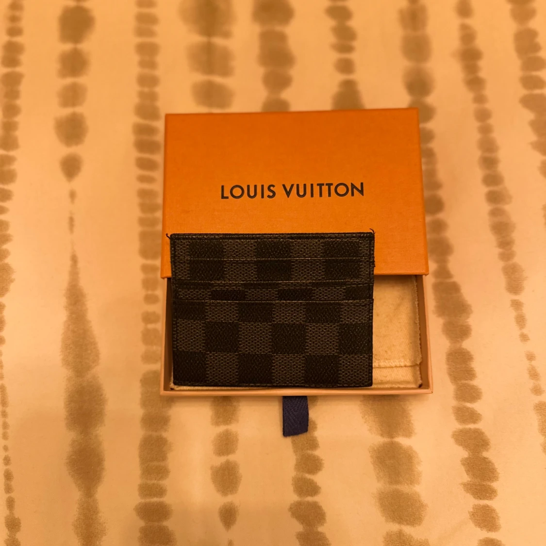 rutmönstrad korthållare