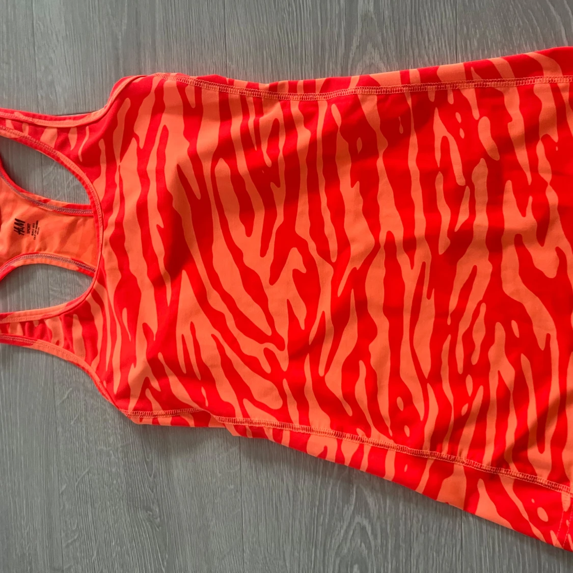 Orange zebramönstrad linnetopp H&M