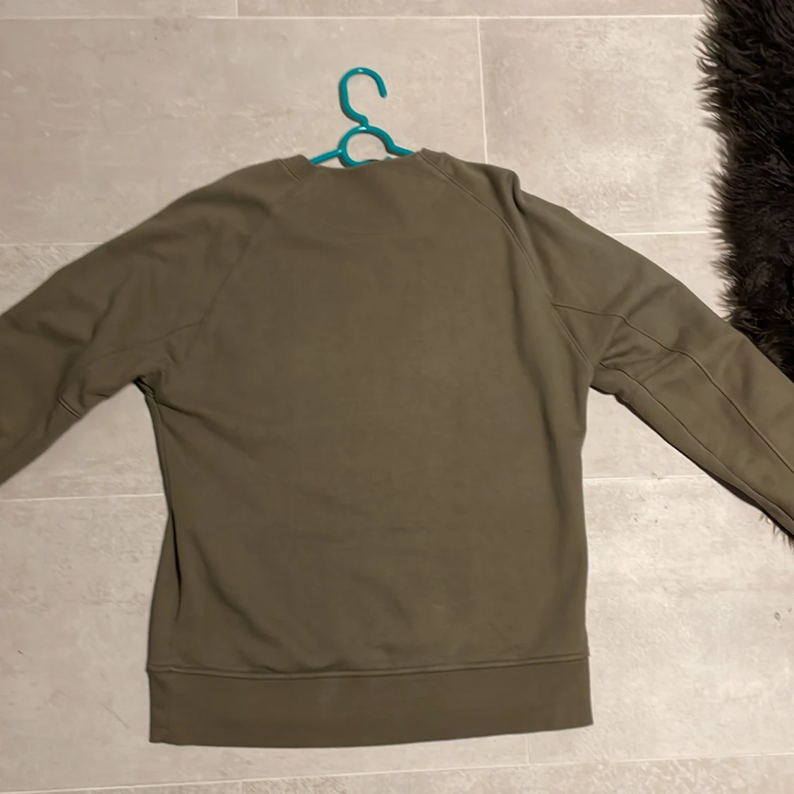 Olivgrön sweatshirt från C.P. Company - 4