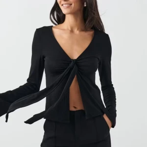 Knyt tröja från Gina Tricot - Svart långärmad knyt tröja från Gina tricot i storlek XXS