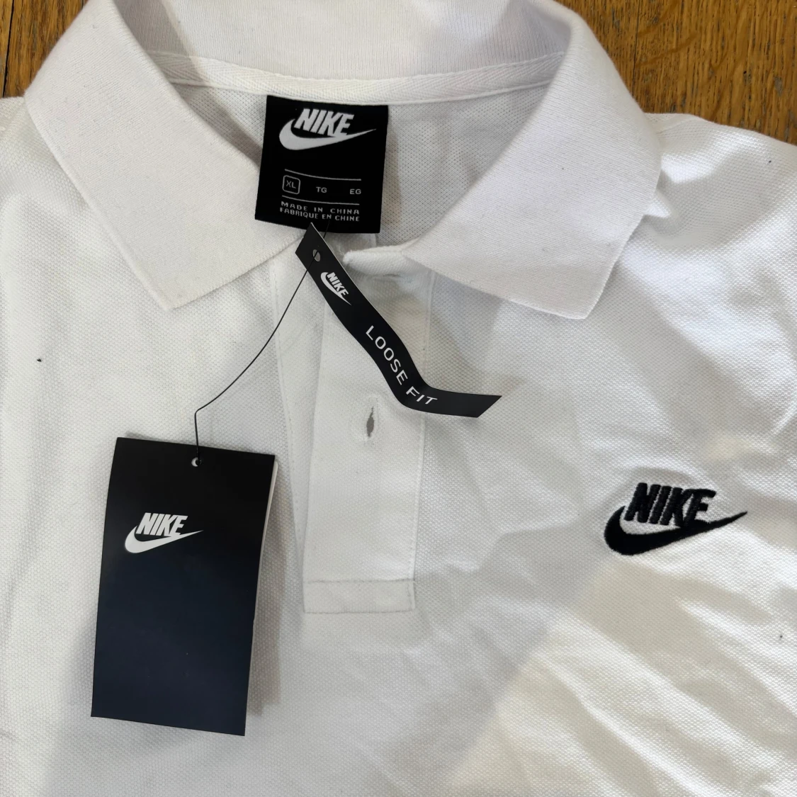 Vit pikétröja från Nike - 3