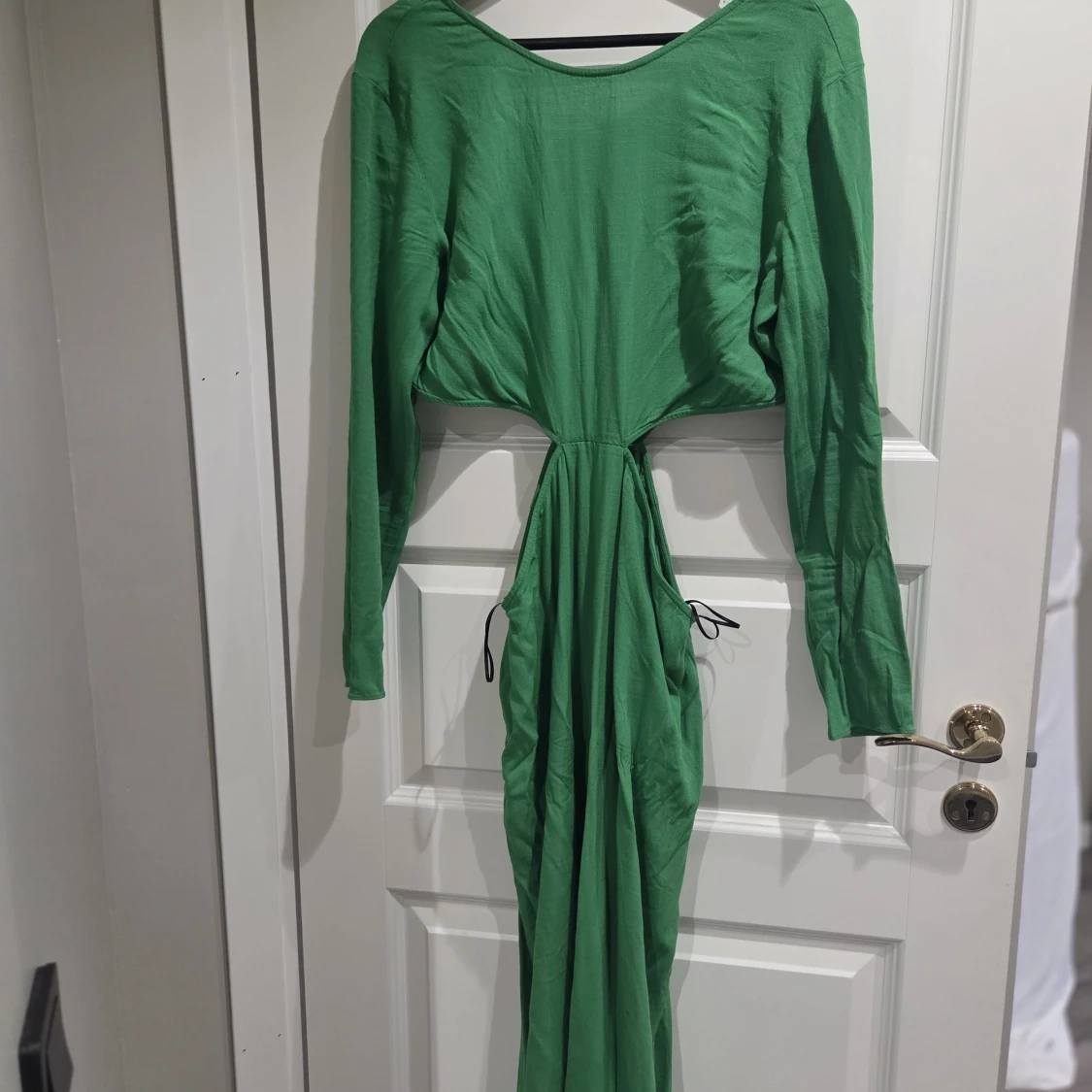 Grön långklänning med snörning