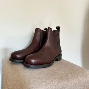 Bruna Boots (Park West) - Boots från Park West i nyskick, aldrig använda. Storlek 41 