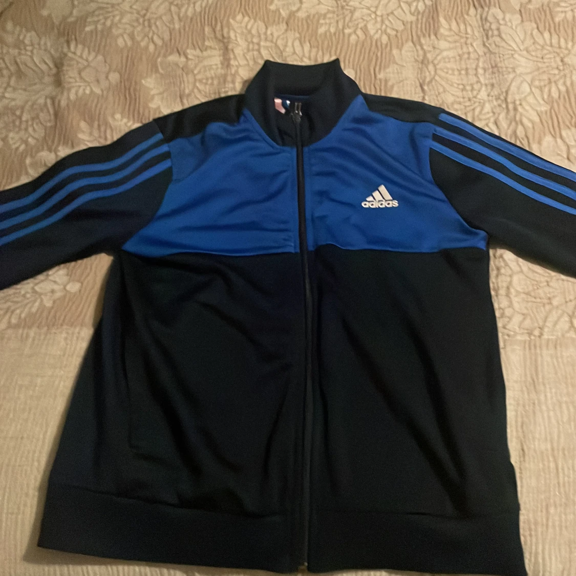 Blå och svart Adidas träningsjacka