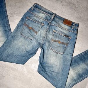 Nudie jeans - Nudie jeans | Modell Grim Tim | Bra skick | Storlek W33 L34. 