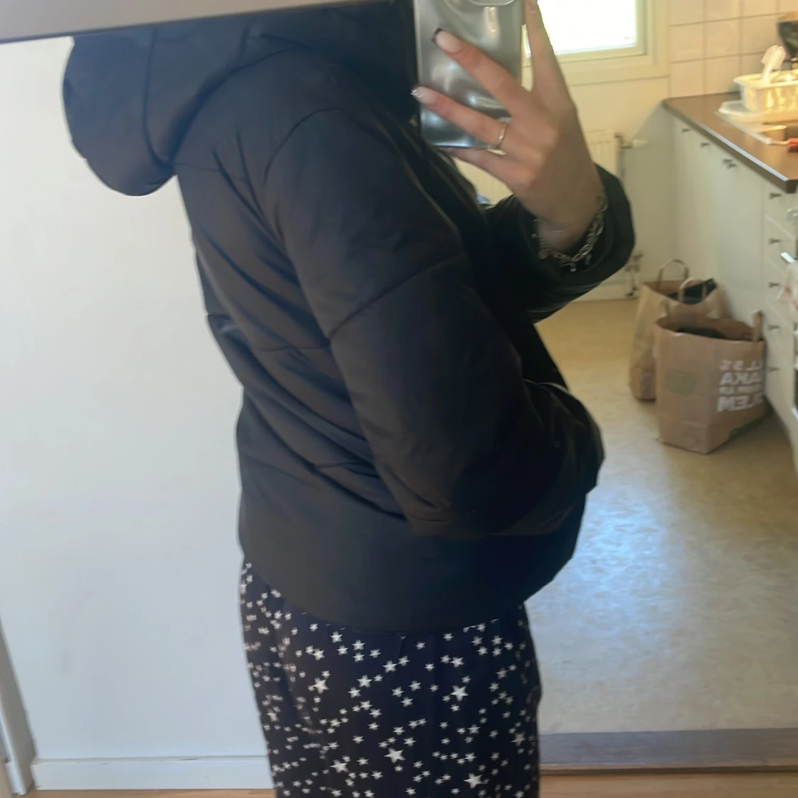 Svart pufferjacka från Nike - 1