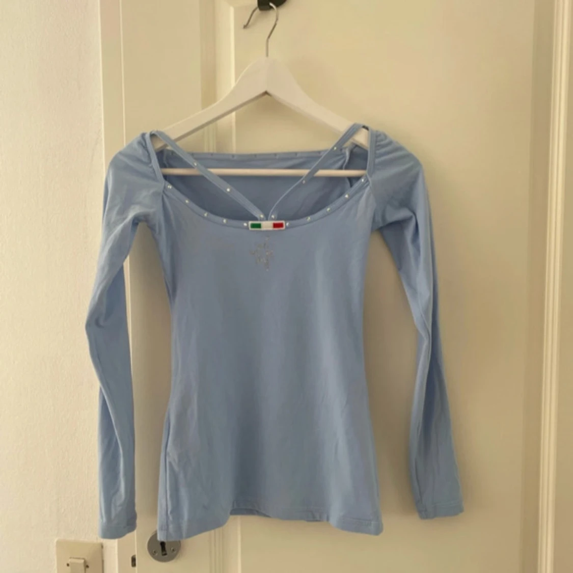 Ljusblå karisma tita topp - 1