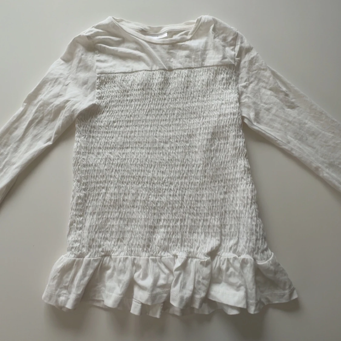 Vit långärmad topp från Gina Tricot