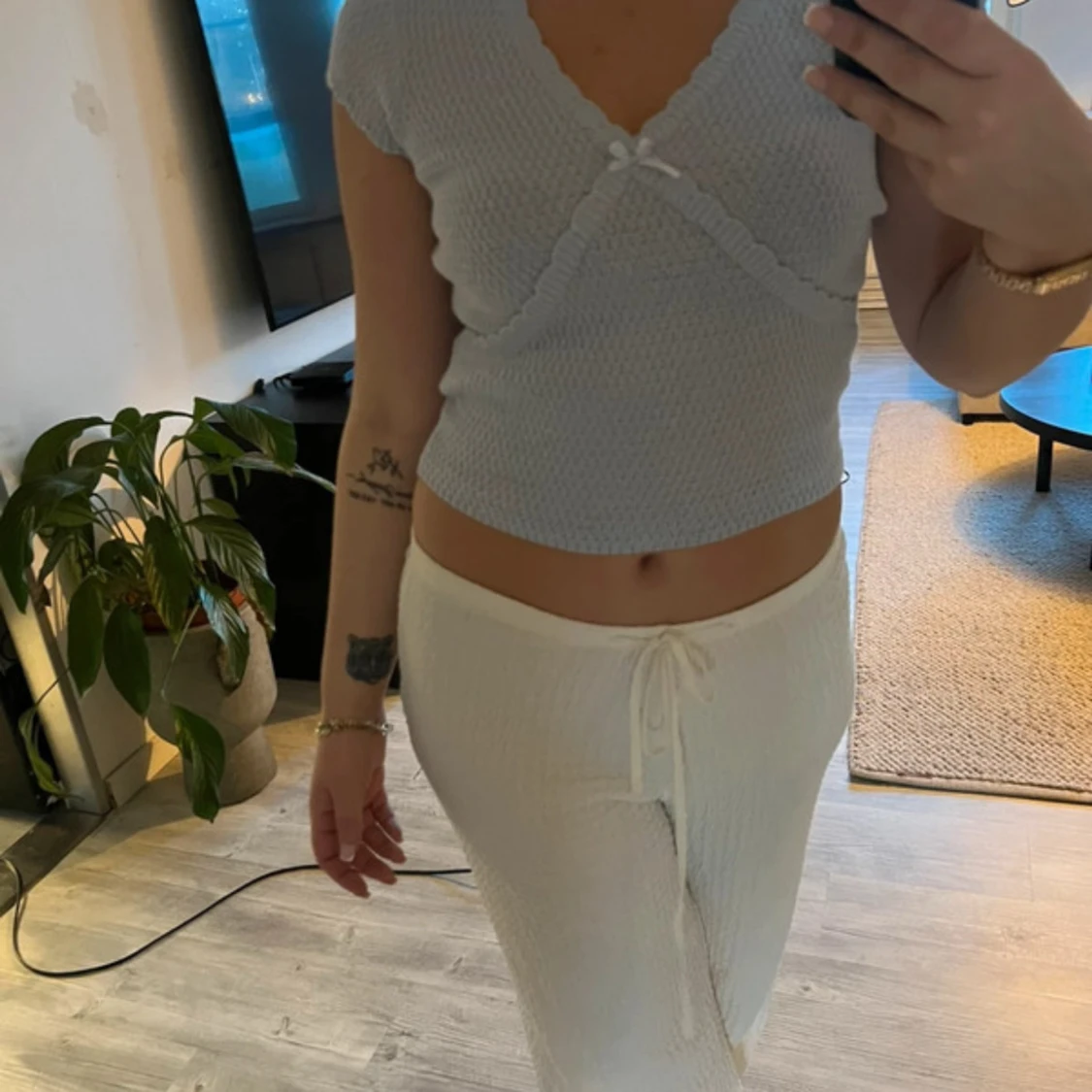 Ljusblå croppad blus med rosett - 1