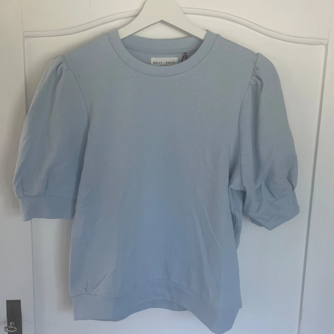 Ljusblå tröja från Holly & Whyte