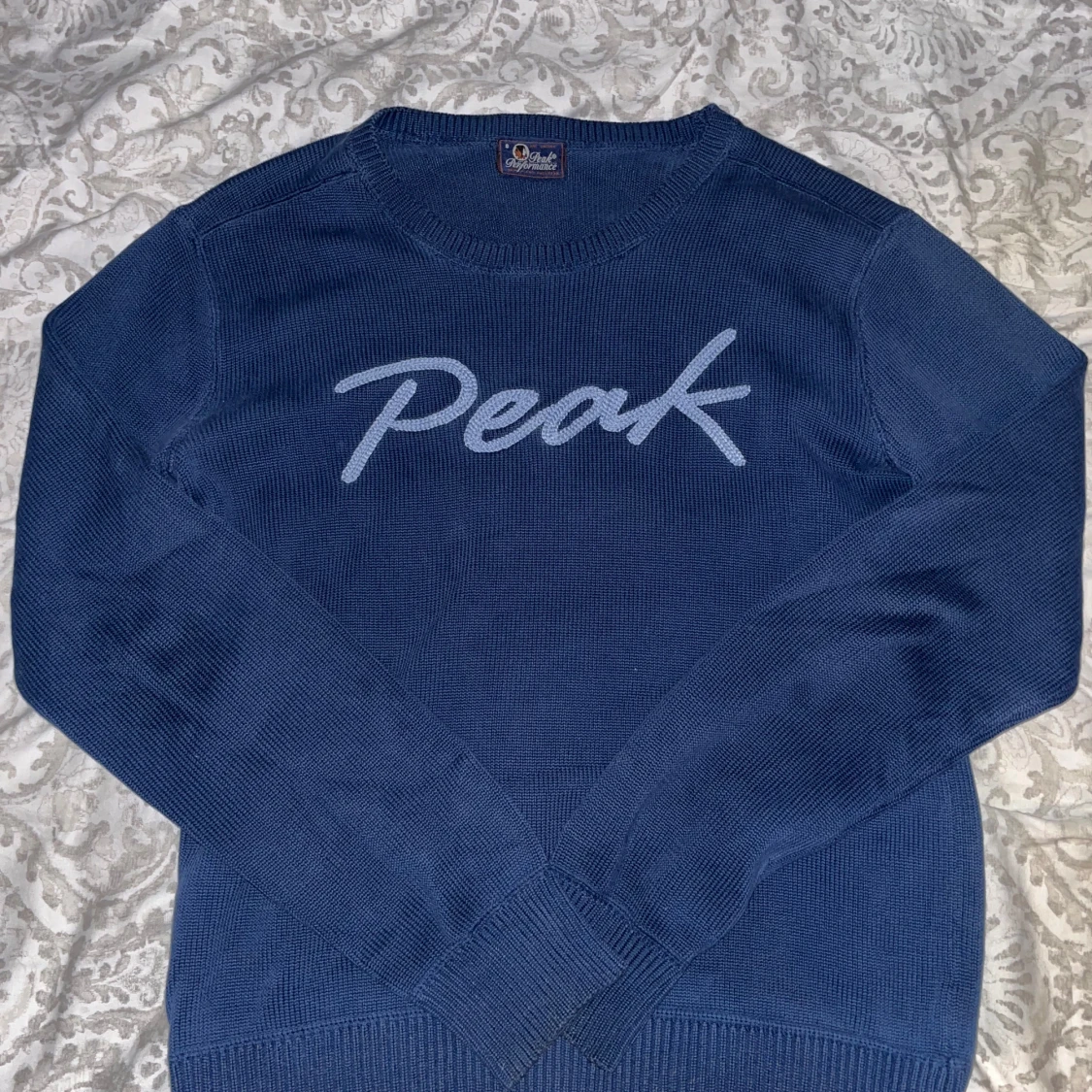 Blå stickad Peak Performance tröja - 1
