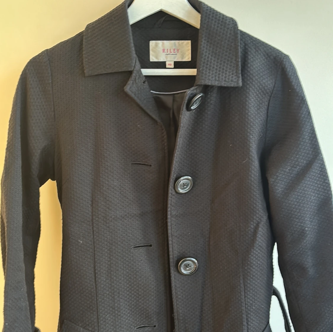 Svart kappa från Riley
