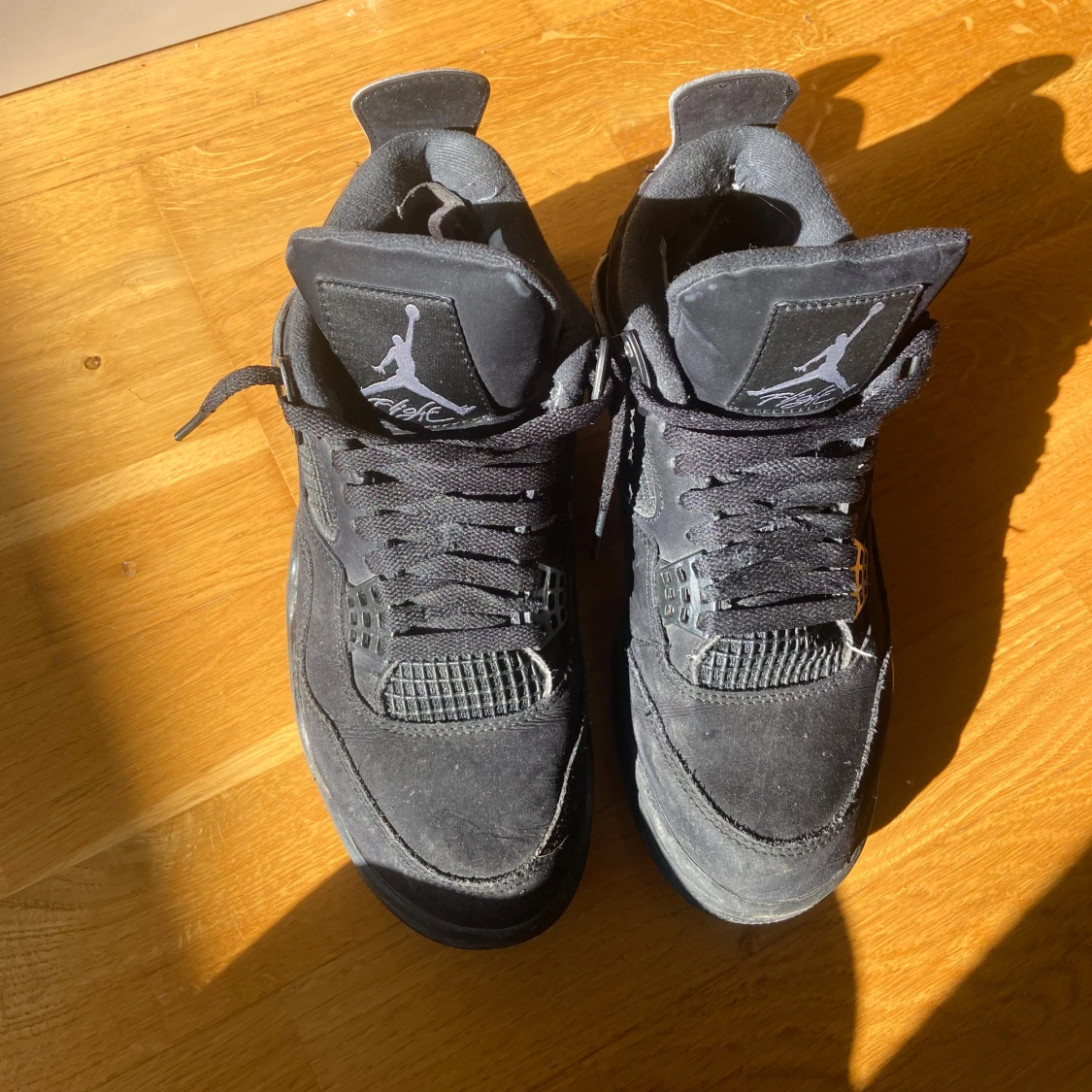 Black cats Jordan 4  - 1