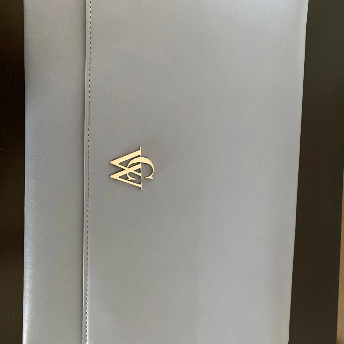 Ljusblå kuvertväska från Carin Wester