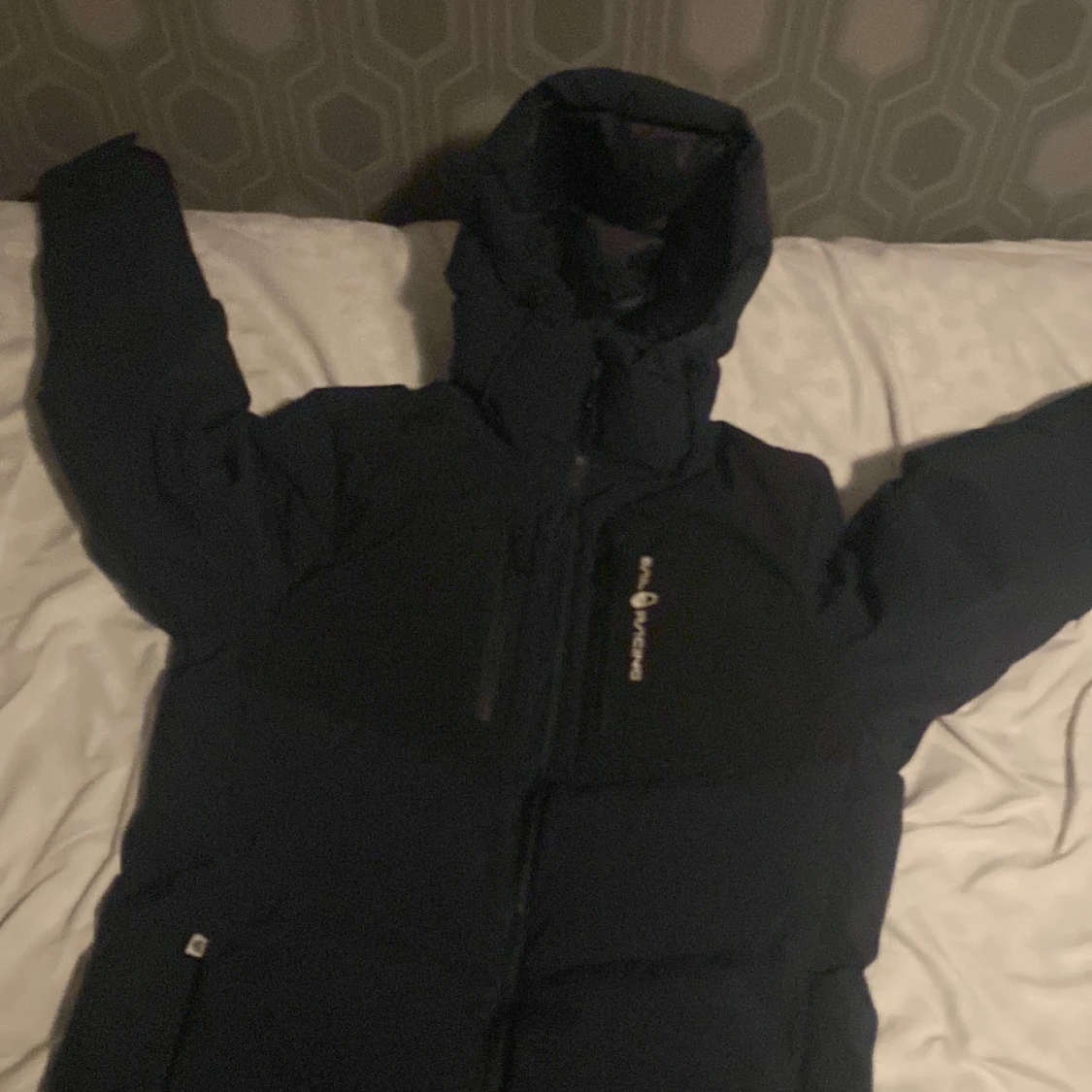 Mörkblå dunjacka från sailracing