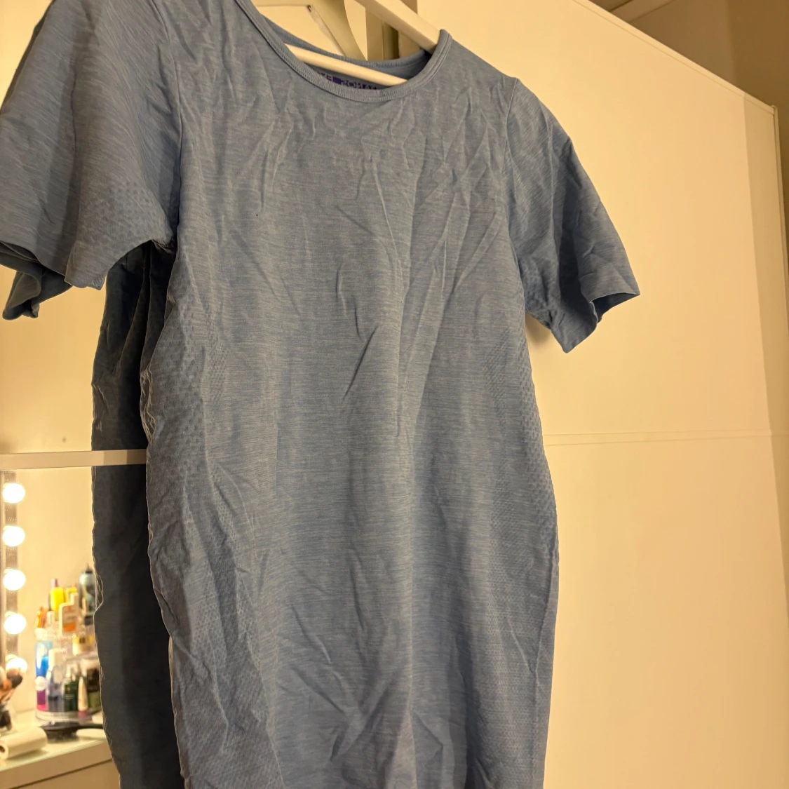 Ljusblå träningströja - 1