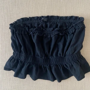 Bandeu topp - Bandeu topp med resor i midjan