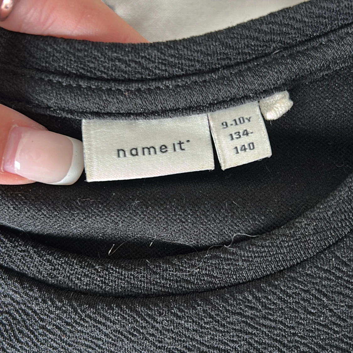 Svart långärmad tröja med pärlor - 1