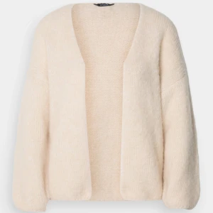 Ny kofta - Som ny använt en gång